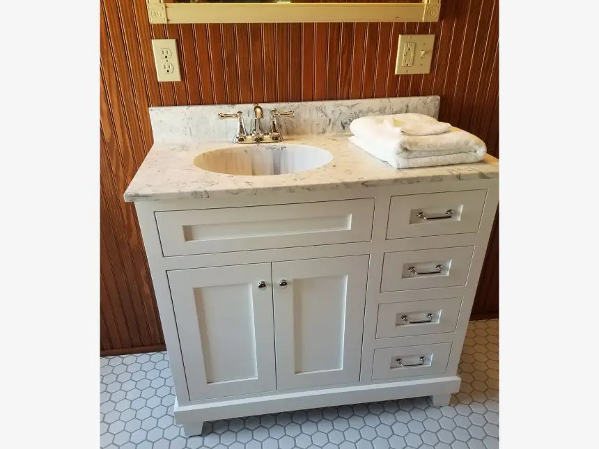 Granite sink with wooden cabinet